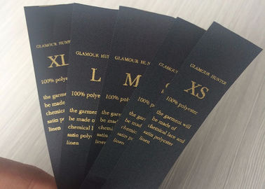 중국 반짝임 상표 검정 뜨거운 각인 로고 돋을새김 인쇄를 가진 주문 스티커 상표 공장